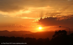 Sun sets over the Brindabella Ranges through bushfire smoke 6 January 2013