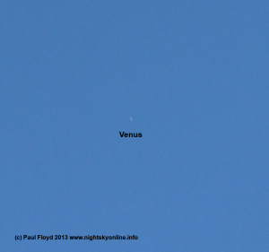 Venus photographed during the day with a 250 mm focal length lens equipped DSLR.